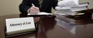Attorney At Law signs gender malpractice lawsuits